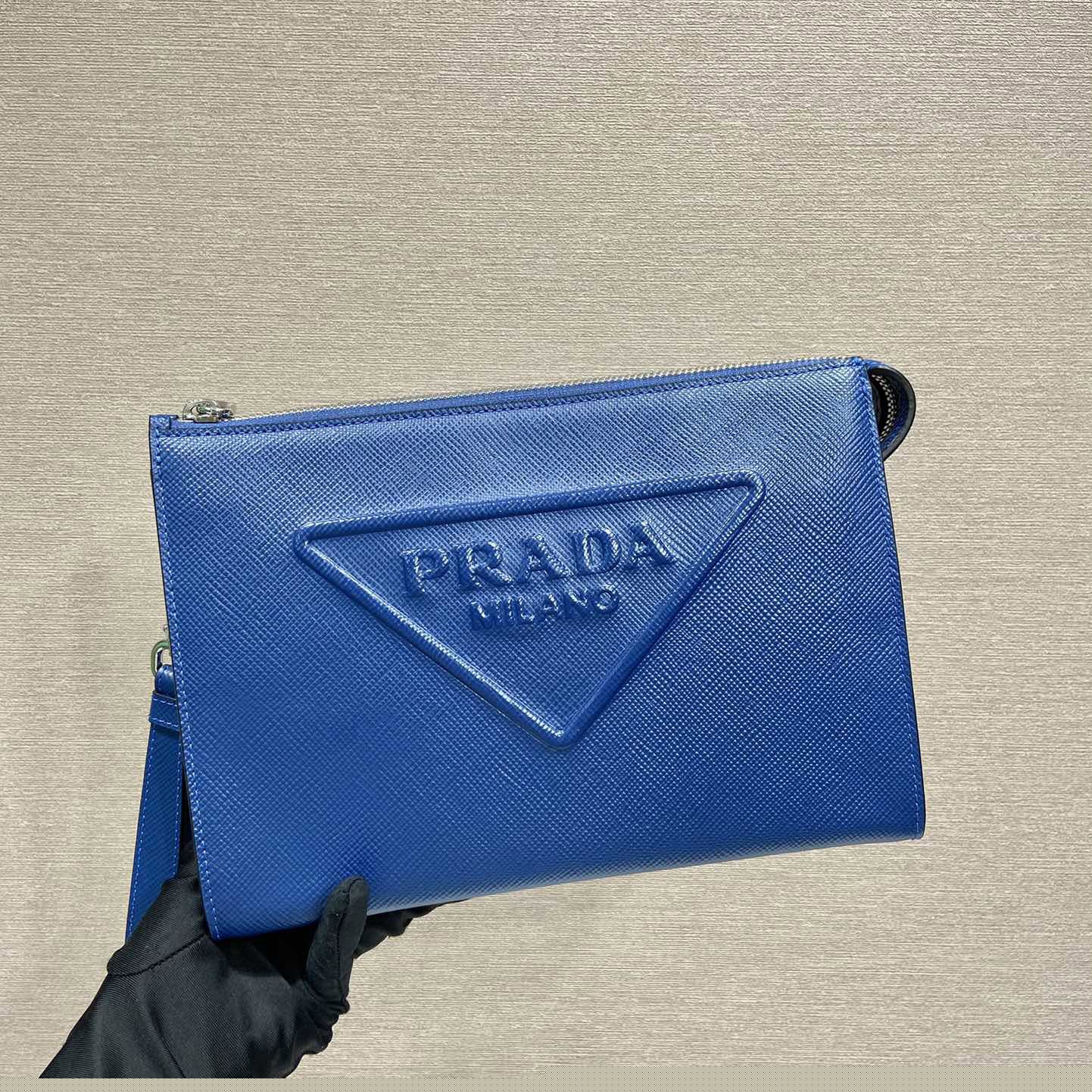 Pra*a clutch bags